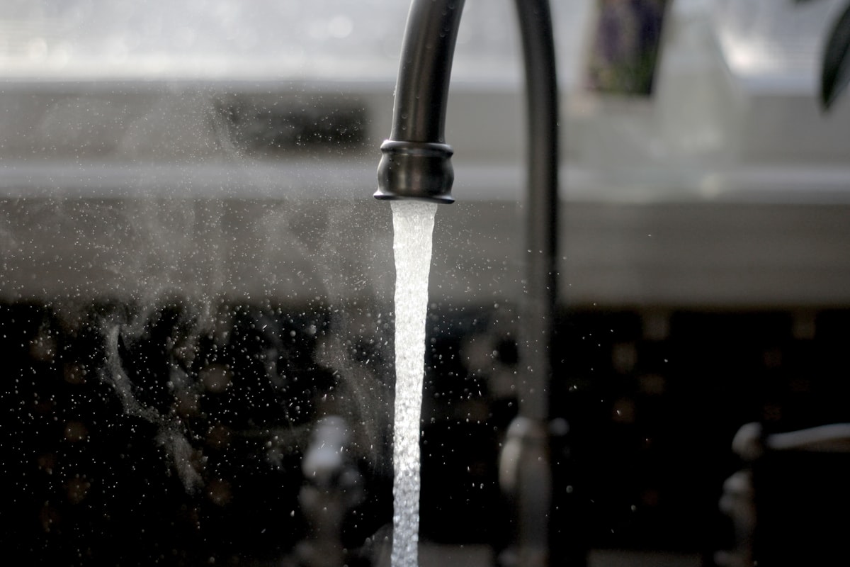 Kitchen tap with running water