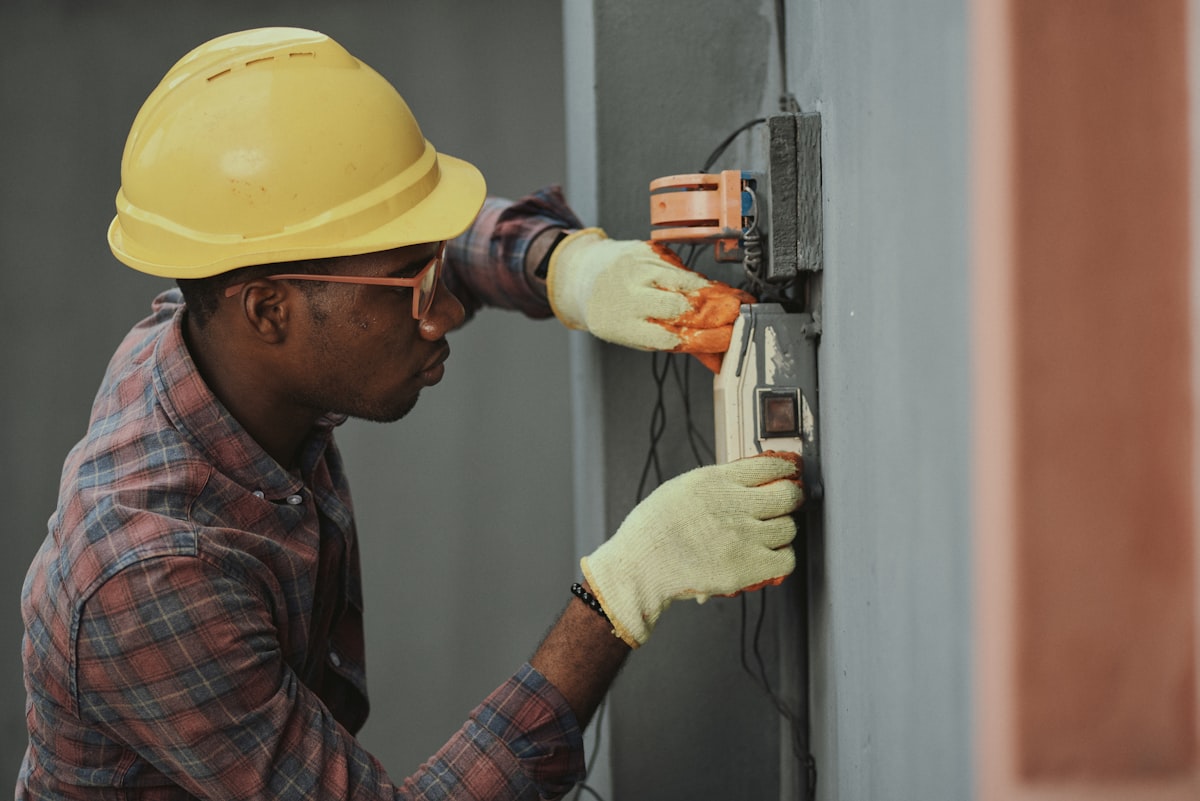 Heating engineer diagnosing a fault