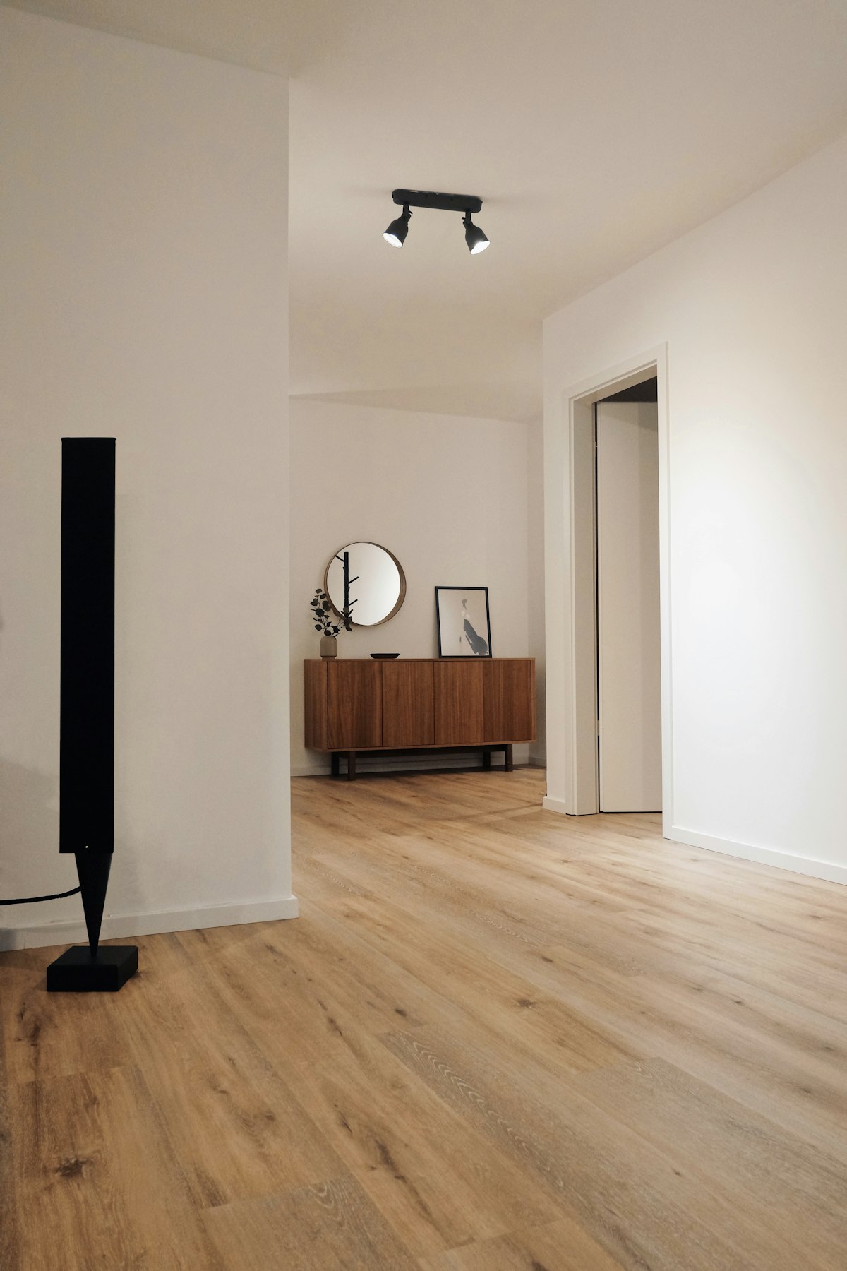 Room with newly installed wooden floor over underfloor heating